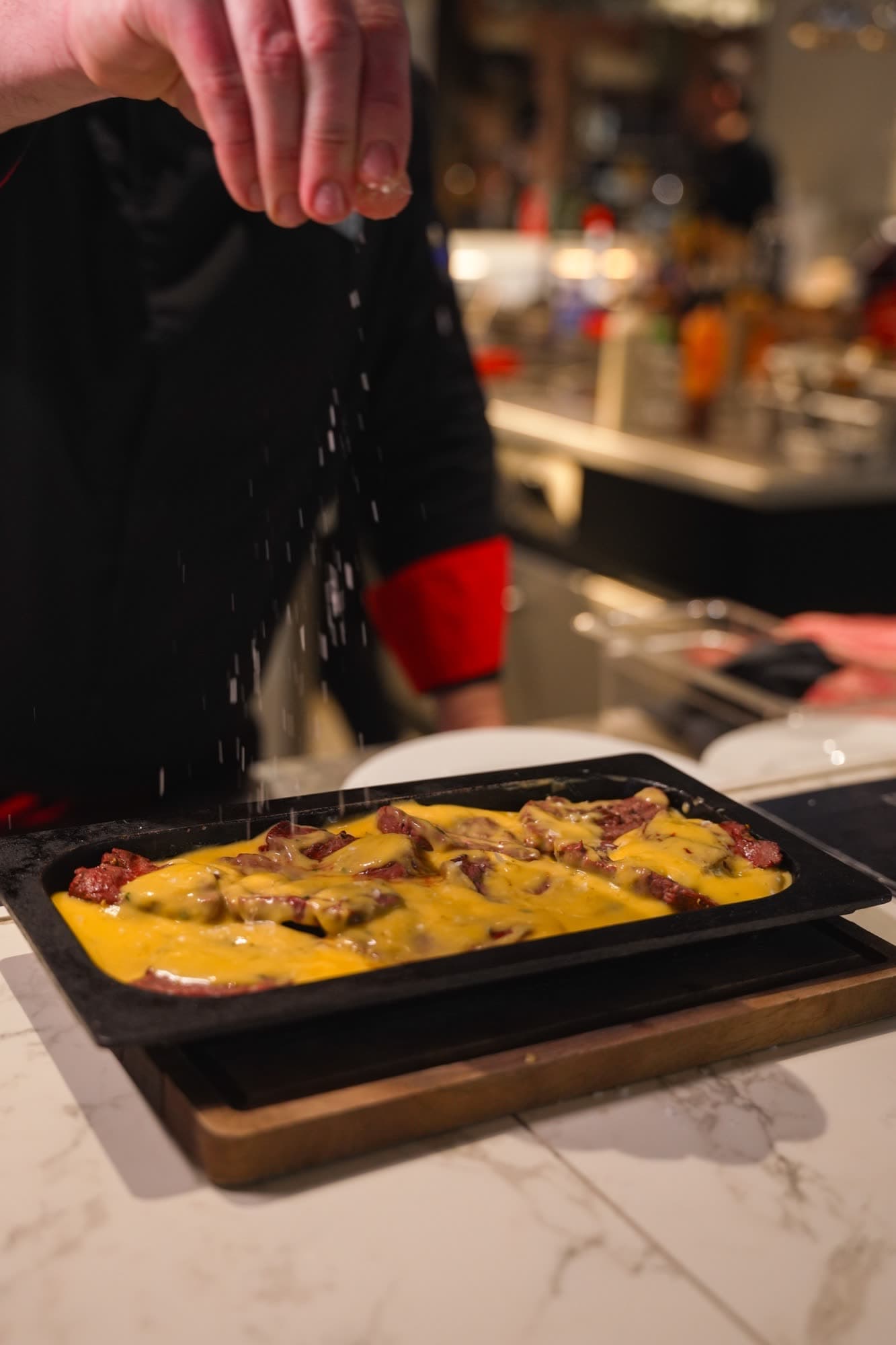 Café de Paris butter sauce being prepared tableside