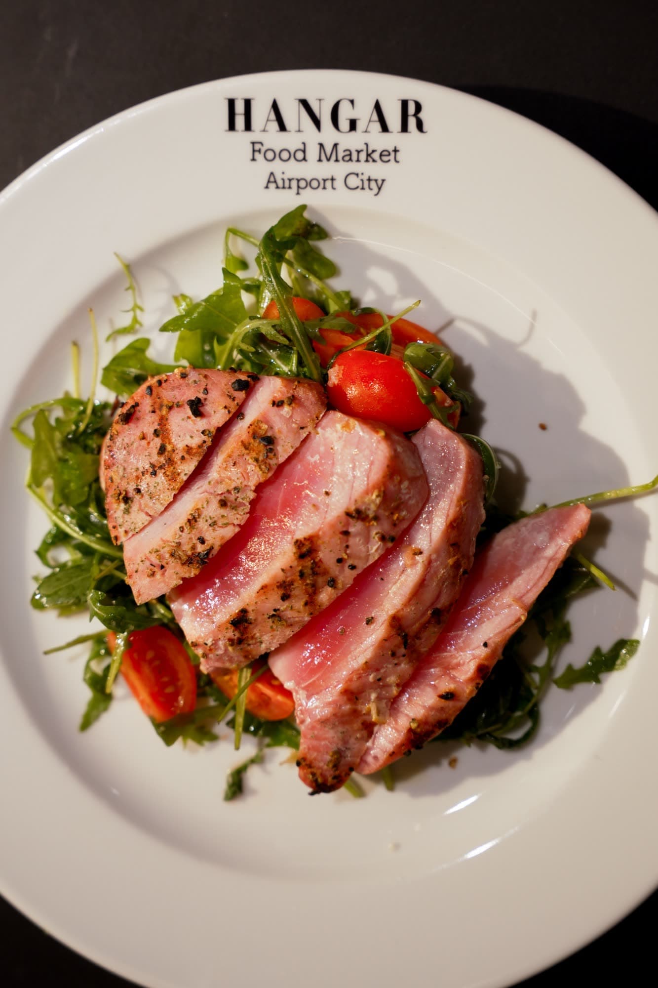 Tuna by Josper on Hangar Food Market plate with arugula