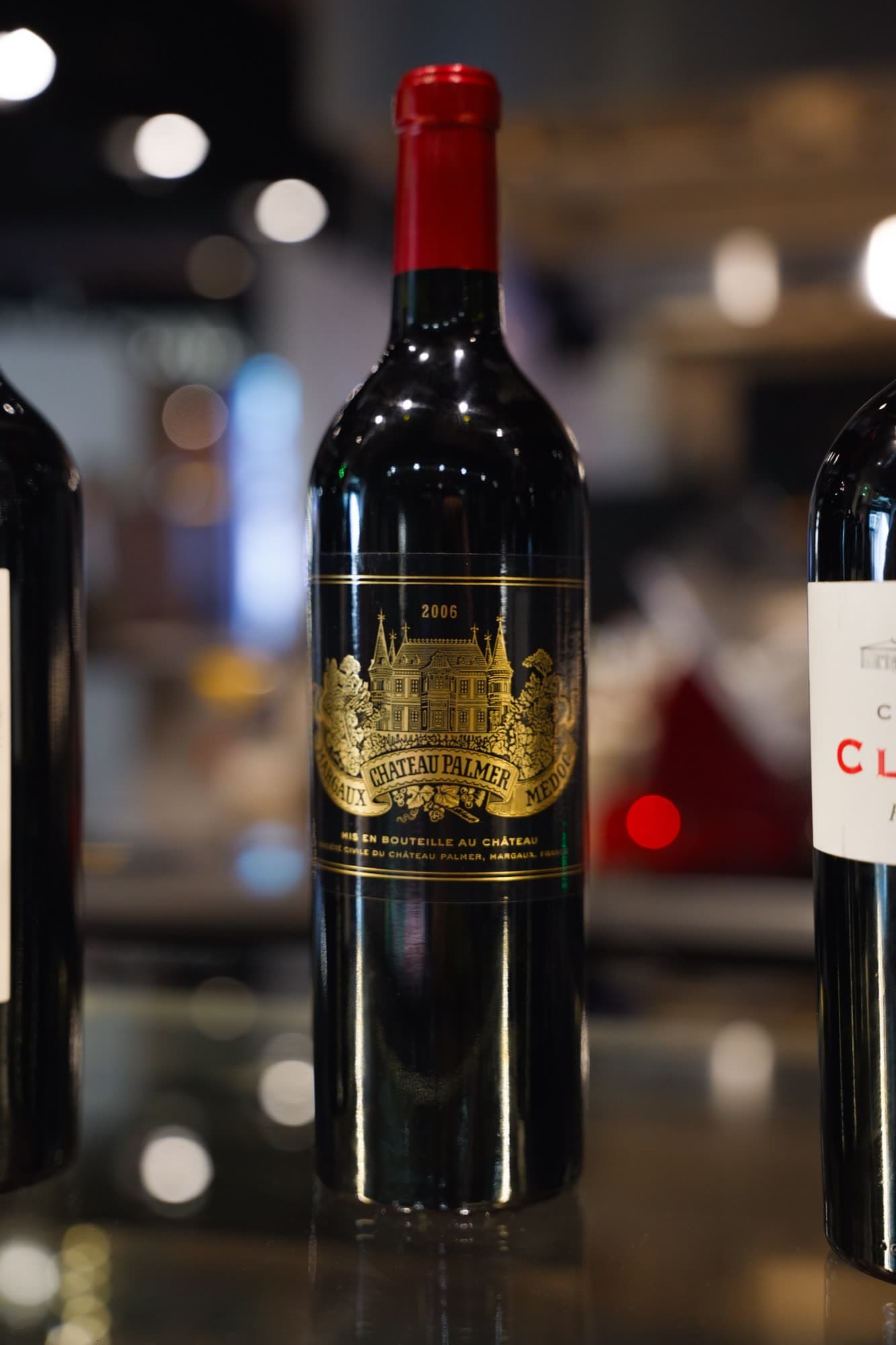 Château Palmer wine bottle with golden label